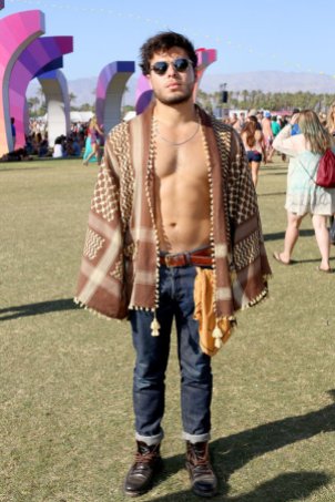 INDIO, CA - APRIL 12: Music fan Omar Omas wearing APC jeans attends the 2015 Coachella Valley Music and Arts Festival - Weekend 1 at The Empire Polo Club on April 12, 2015 in Indio, California. (Photo by Rachel Murray/Getty Images for Coachella)